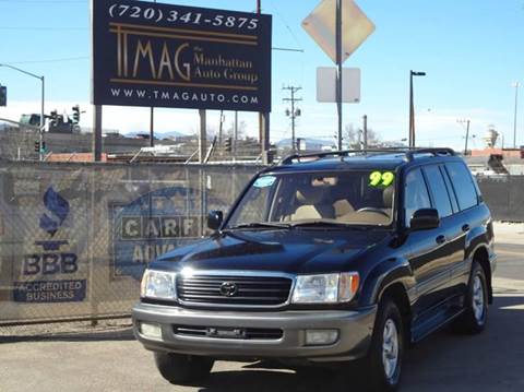 1999 Toyota Land Cruiser for sale at THE MANHATTAN AUTO GROUP in Greeley CO