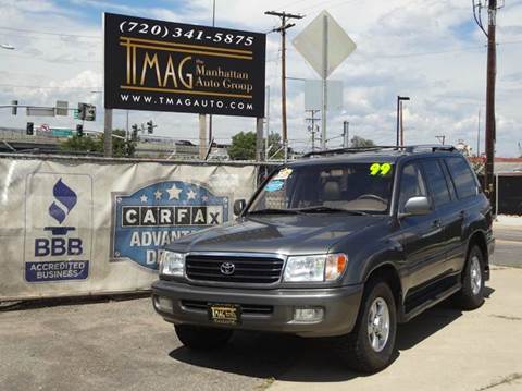 1999 Toyota Land Cruiser for sale at THE MANHATTAN AUTO GROUP in Greeley CO