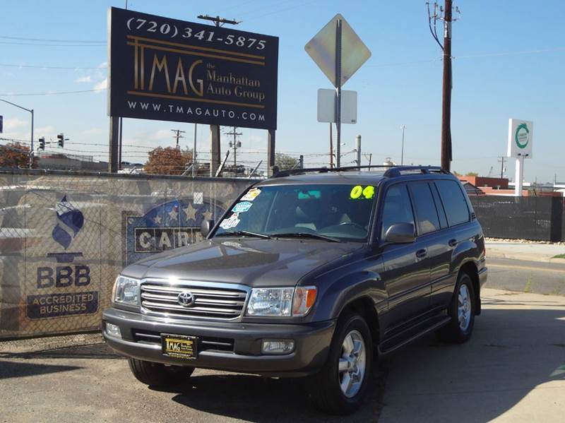 2004 Toyota Land Cruiser for sale at THE MANHATTAN AUTO GROUP in Lakewood CO