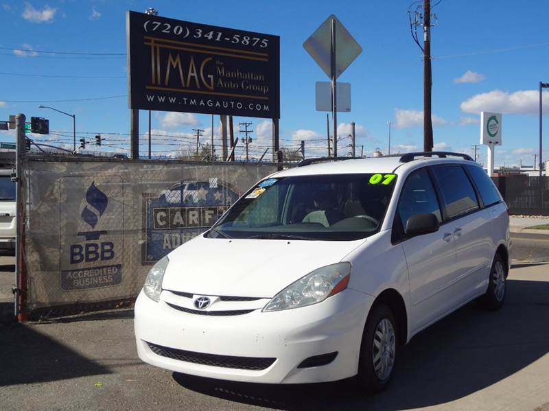 2007 Toyota Sienna for sale at THE MANHATTAN AUTO GROUP in Greeley CO