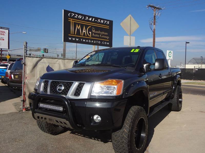 2015 Nissan Titan for sale at THE MANHATTAN AUTO GROUP in Greeley CO
