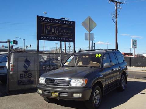 1999 Toyota Land Cruiser for sale at THE MANHATTAN AUTO GROUP in Lakewood CO