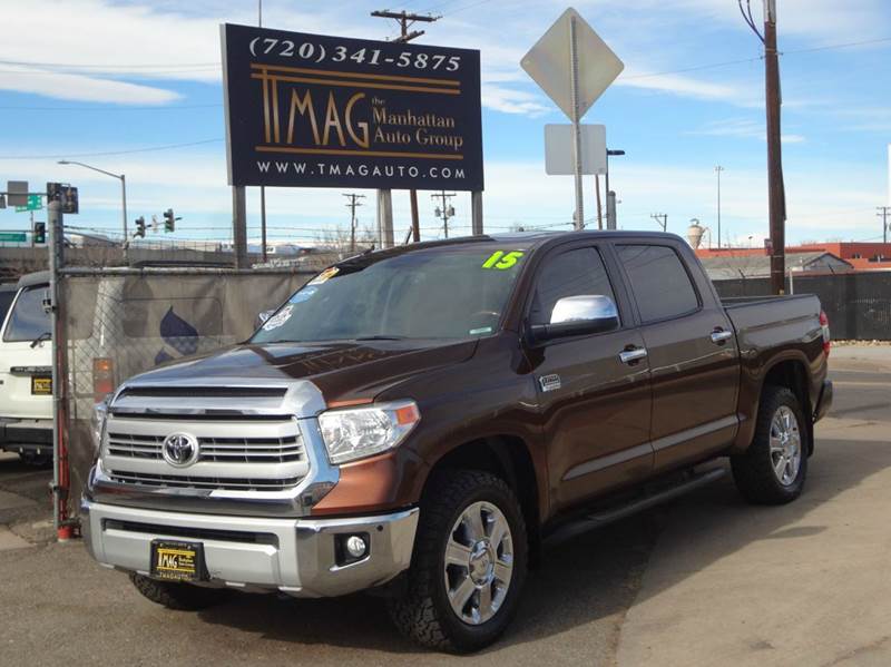 2015 Toyota Tundra for sale at THE MANHATTAN AUTO GROUP in Greeley CO