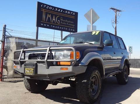 1997 Toyota Land Cruiser for sale at THE MANHATTAN AUTO GROUP in Greeley CO