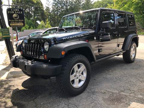 2011 Jeep Wrangler Unlimited for sale at Beverly Farms Motors in Beverly MA