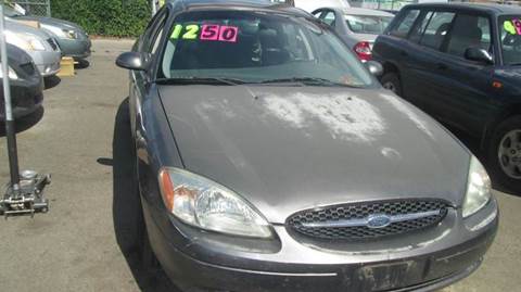 2003 Ford Taurus for sale at Queen Auto Sales in Denver CO