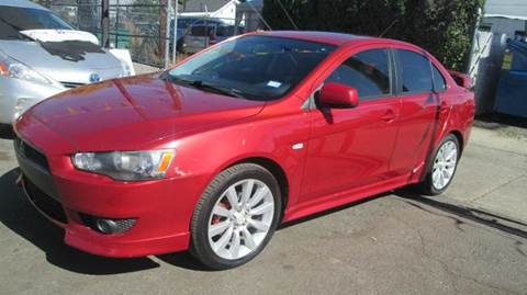 2009 Mitsubishi Lancer for sale at Queen Auto Sales in Denver CO