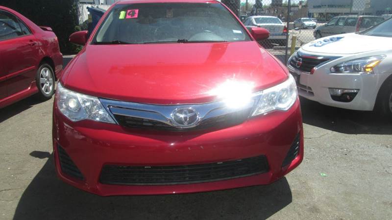 2014 Toyota Camry for sale at Queen Auto Sales in Denver CO