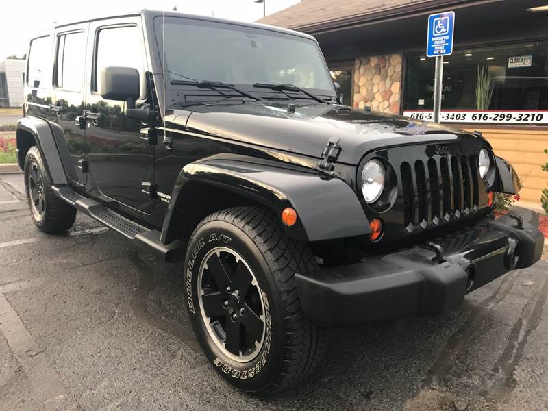 2012 Jeep Wrangler Unlimited for sale at Finish Line Auto in Comstock Park MI