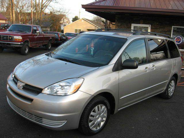 2004 Toyota Sienna for sale at Unique Auto, LLC in Sellersburg IN