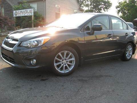 2012 Subaru Impreza for sale at Unique Auto, LLC in Sellersburg IN