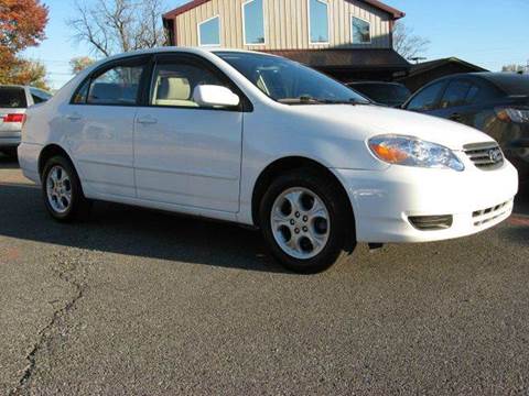 2003 Toyota Corolla for sale at Unique Auto, LLC in Sellersburg IN
