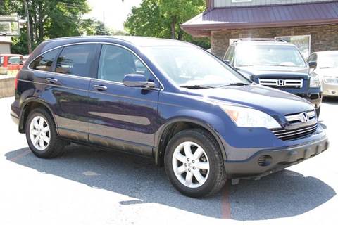 2009 Honda CR-V for sale at Unique Auto, LLC in Sellersburg IN