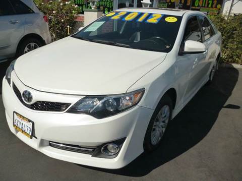 2012 Toyota Camry for sale at La Mesa Auto Sales in Huntington Park CA