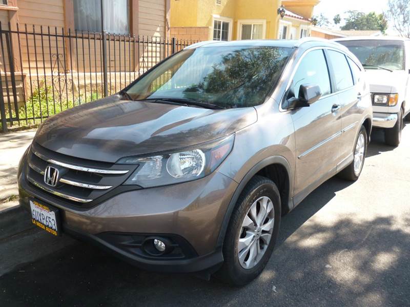 2012 Nissan Rogue for sale at La Mesa Auto Sales in Huntington Park CA