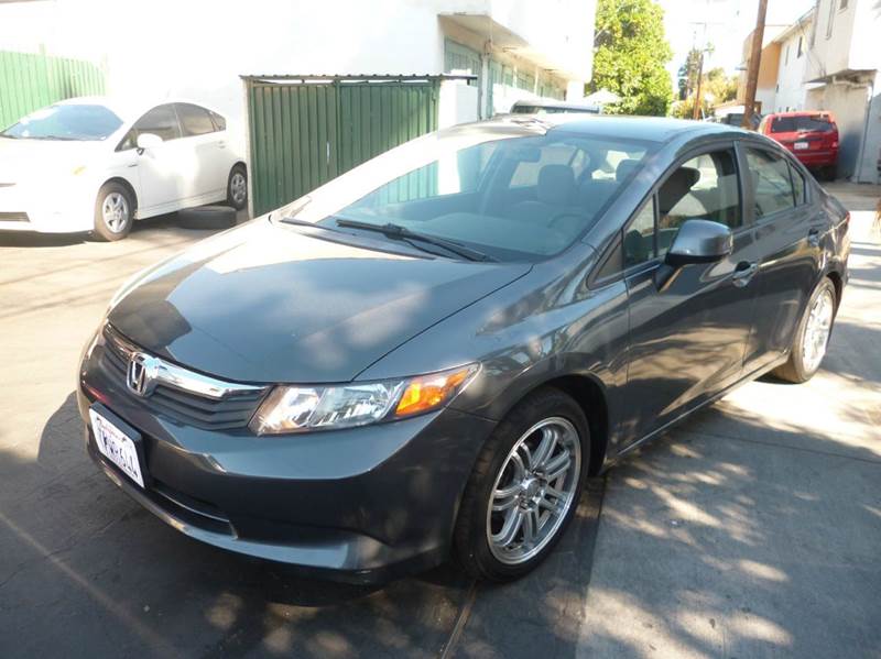 2012 Honda Civic for sale at La Mesa Auto Sales in Huntington Park CA