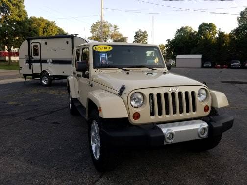 2011 Jeep Wrangler Unlimited for sale at Rombaugh's Auto Sales in Battle Creek MI