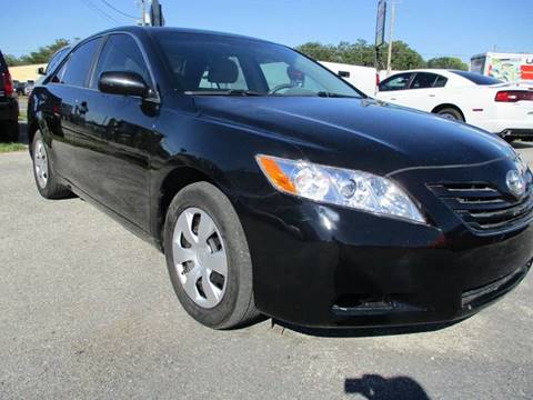2009 Toyota Camry for sale at Marvin Motors in Kissimmee FL