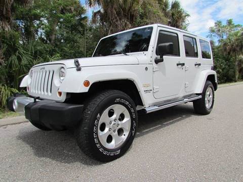 2013 Jeep Wrangler Unlimited for sale at Wade Truck and Auto in Venice FL