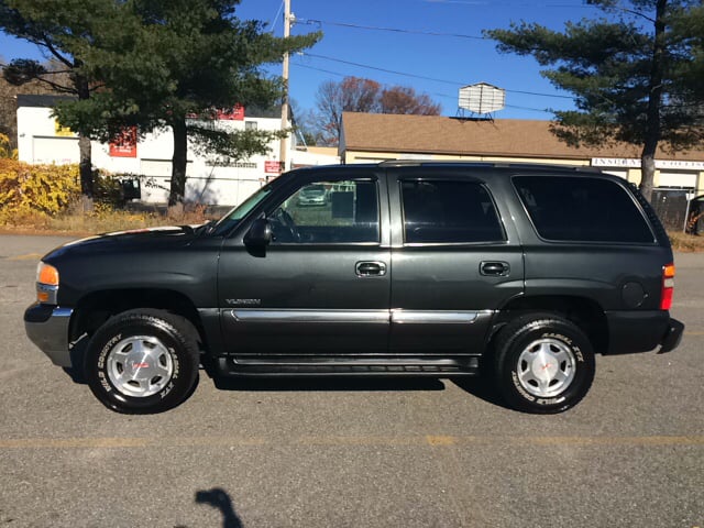 2003 GMC Yukon for sale at D'Ambroise Auto Sales in Lowell MA