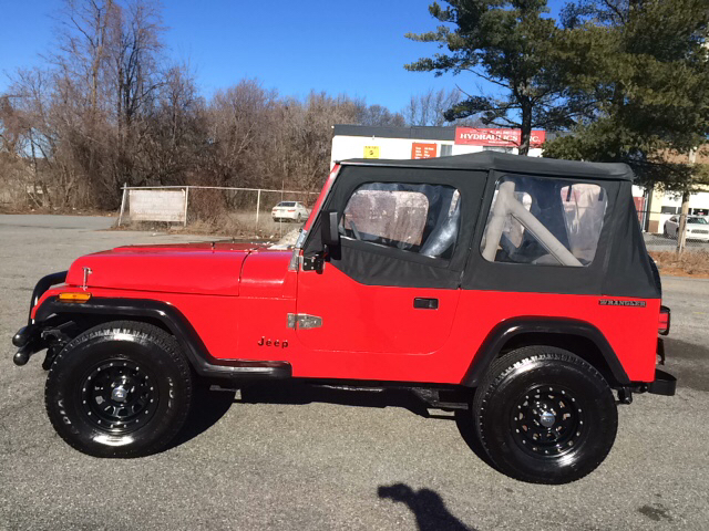 1989 Jeep Wrangler for sale at D'Ambroise Auto Sales in Lowell MA