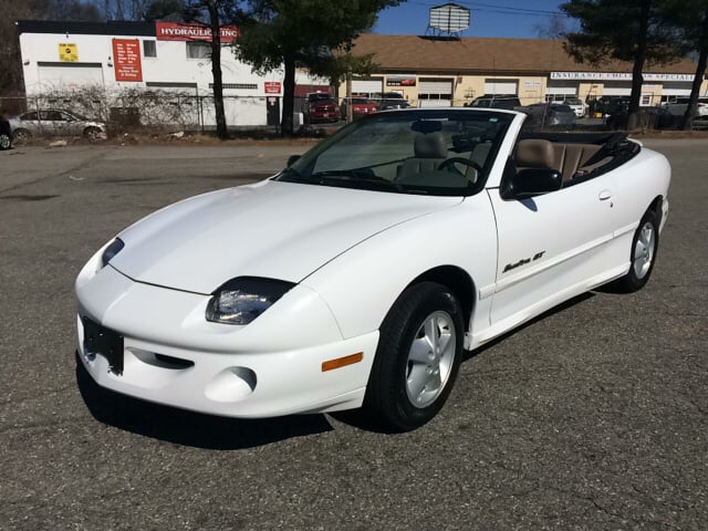 1999 Pontiac Sunfire for sale at D'Ambroise Auto Sales in Lowell MA