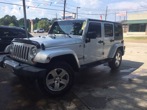 2009 Jeep Wrangler Unlimited for sale at SW AUTO LLC in Lafayette LA