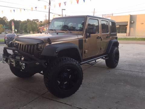 2015 Jeep Wrangler Unlimited for sale at SW AUTO LLC in Lafayette LA