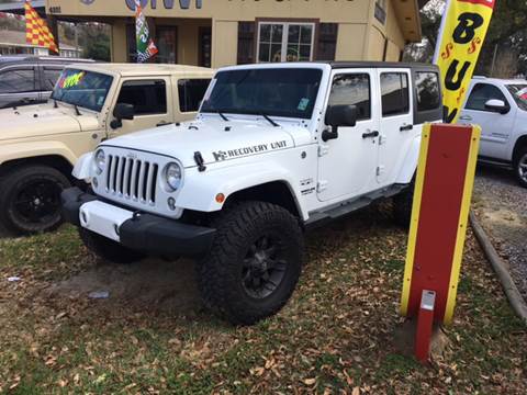 2016 Jeep Wrangler Unlimited for sale at SW AUTO LLC in Lafayette LA