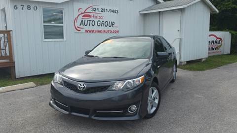 2012 Toyota Camry for sale at HORIZON AUTO GROUP INC in Orlando FL