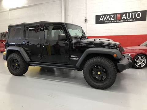 2014 Jeep Wrangler Unlimited for sale at AVAZI AUTO GROUP LLC in Gaithersburg MD