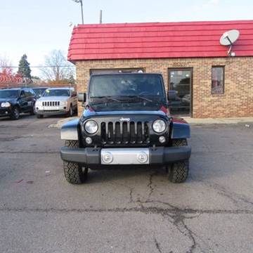 2014 Jeep Wrangler Unlimited for sale at ROYAL CAR CENTER INC in Detroit MI