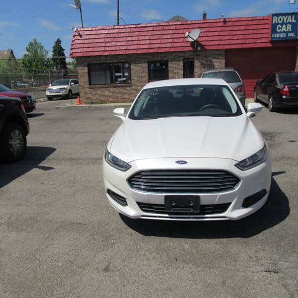 2014 Ford Fusion for sale at ROYAL CAR CENTER INC in Detroit MI