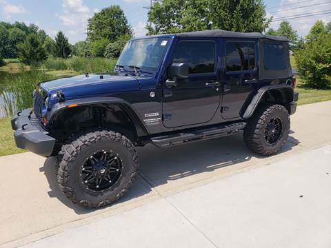 2013 Jeep Wrangler Unlimited for sale at Exclusive Automotive in West Chester OH
