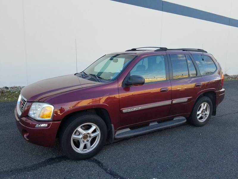 2003 GMC Envoy for sale at Positive Auto Sales, LLC in Hasbrouck Heights NJ