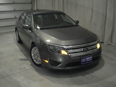 2011 Ford Fusion Hybrid for sale at PRISED AUTO in Gladstone MI