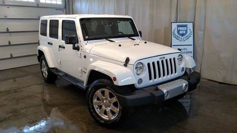 2015 Jeep Wrangler Unlimited for sale at PRISED AUTO in Gladstone MI