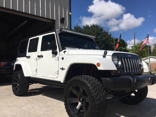 2013 Jeep Wrangler Unlimited for sale at Sugarland Auto Finance in Houston TX