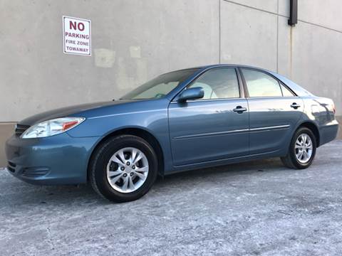 2004 Toyota Camry for sale at International Auto Sales in Hasbrouck Heights NJ