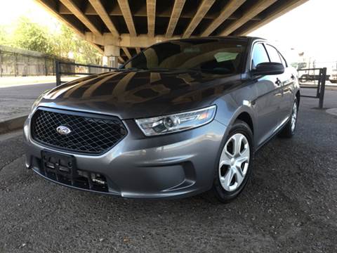2013 Ford Taurus for sale at MT Motor Group LLC in Phoenix AZ